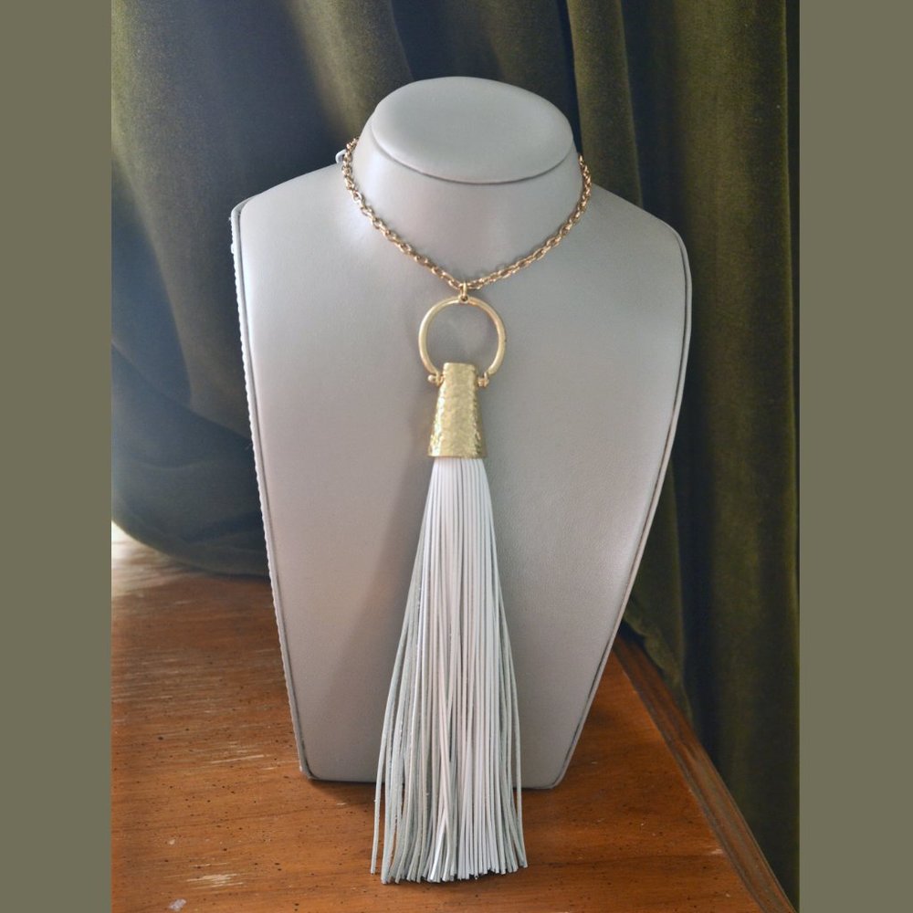 White Leather tassel necklace with gold tone chain